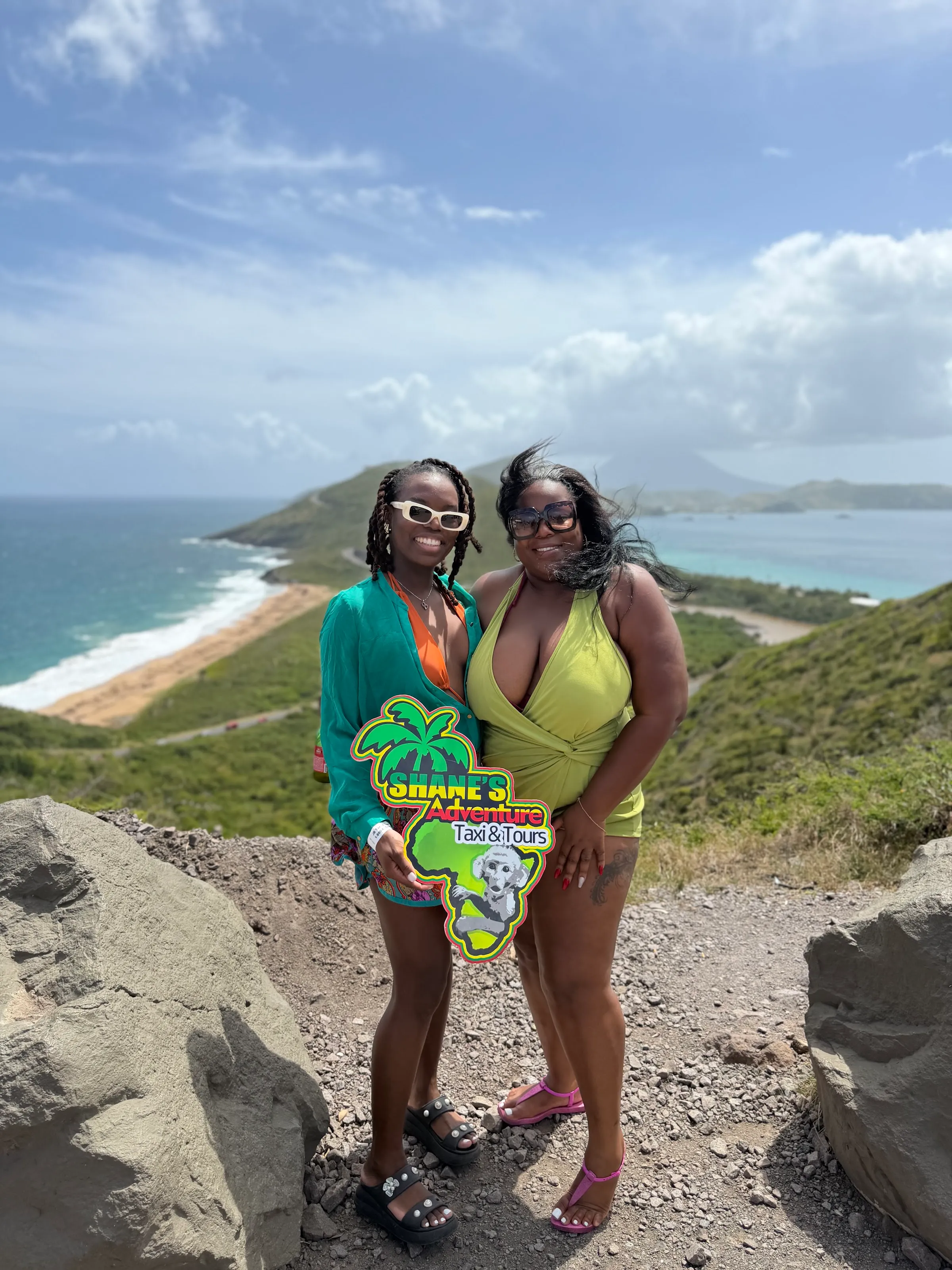 Two guests at a coastal lookout in St. Kitts